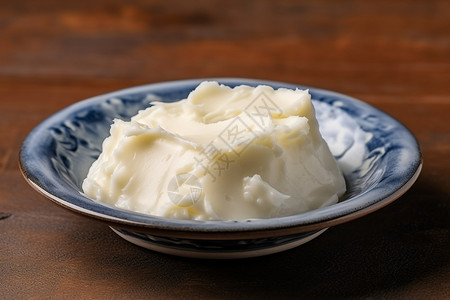 酸奶油熬制的一碗猪油背景