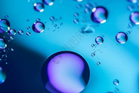 水滴形状流程背景蓝色油滴水面设计图片