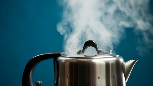 烧开的热水壶散发的蒸气背景图片