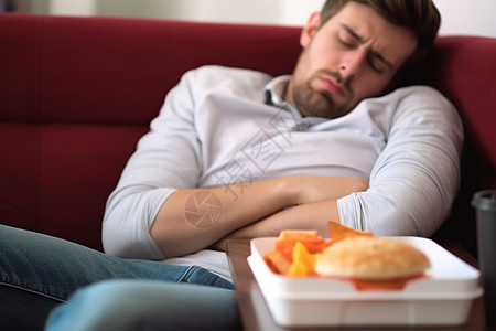 饮食不健康男子宿醉后吃不下食物背景