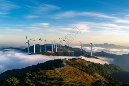 山脉上的风车围绕的云雾风力发电图片