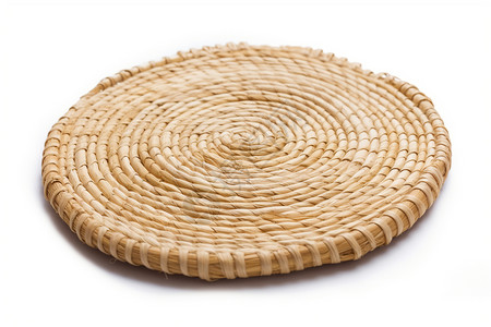 圆形稻草手工编织垫子背景图片