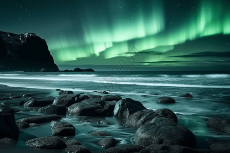 海浪岩石海滩上空的北极光设计图片