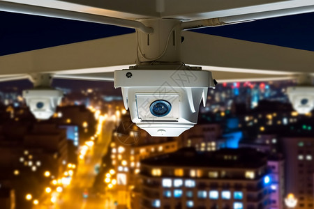 夜间监控在夜间高层建筑下的摄像机背景