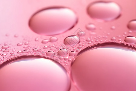 粉色水滴背景背景图片