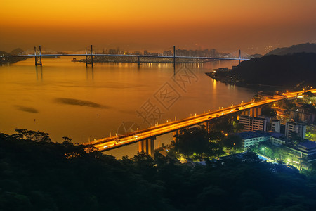 傍晚的交通跨河大桥高清图片