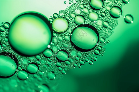 滴液油滴气泡的绿色背景设计图片