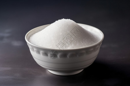 陶瓷碗里的白砂糖背景图片