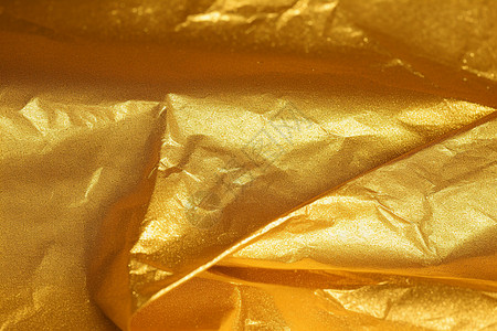 锡纸包鱼金色闪光的金箔纸设计图片