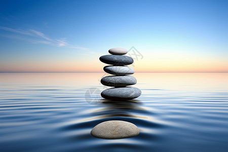 水油平衡平衡水面上的鹅卵石设计图片