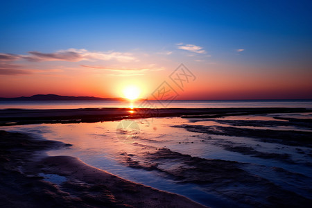 海滩美丽的日落背景图片