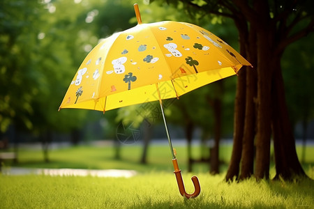 黄色卡通树户外卡通图案的雨伞背景