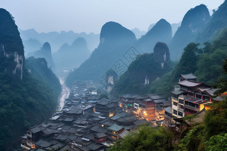 乡镇夜景山脉中的小镇建筑背景