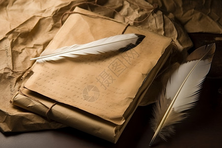 破旧的信纸上的羽毛背景图片
