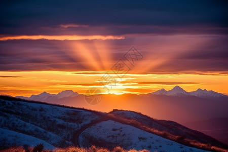 日落的雪山背景图片