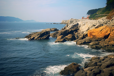 浪花拍打着海边的岩石背景图片