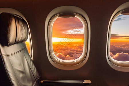 日落时分的飞机舱外景观背景图片