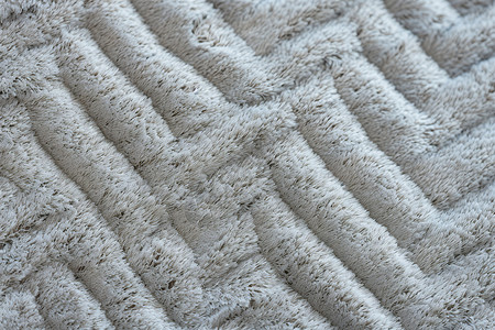 纤维面料带着软毛的灰色地毯背景