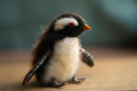 一只逼真的羊毛毡制企鹅高清图片