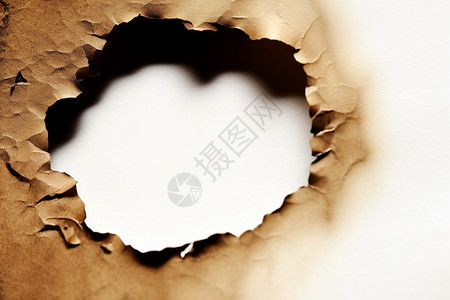 纸火白色纸张中心烧毁痕迹设计图片