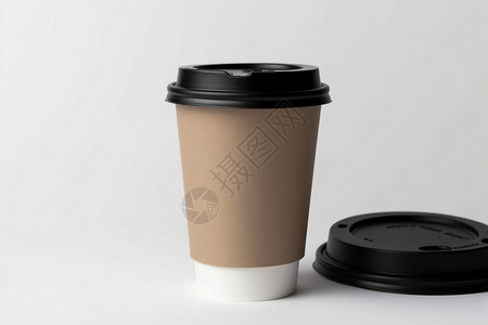 品牌标识桌子上摆放着的咖啡和杯盖背景