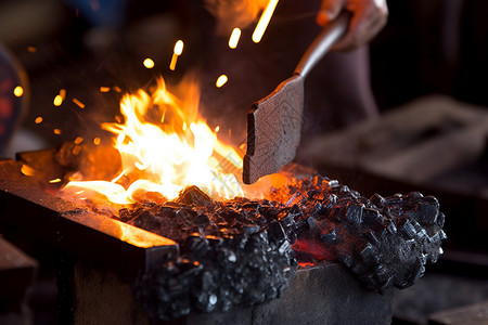利用素材在铁匠在利用炭火锻造工具背景
