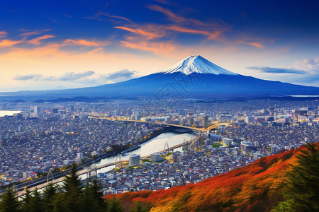 富士山下的城市背景图片