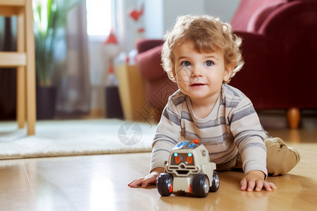 幼儿专注在地上玩小汽车的孩子背景
