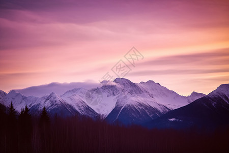 粉色夕阳下壮观的雪山高清图片