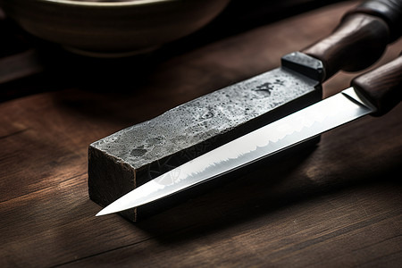 锋利的刀和磨刀石高清图片