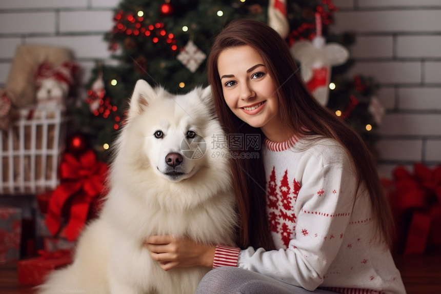 庆祝圣诞节的女子和狗狗图片