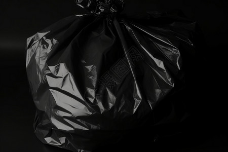 环保的黑色垃圾袋背景图片