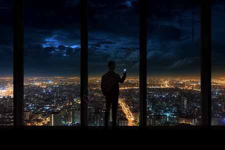 高层建筑下的城市夜景背景图片