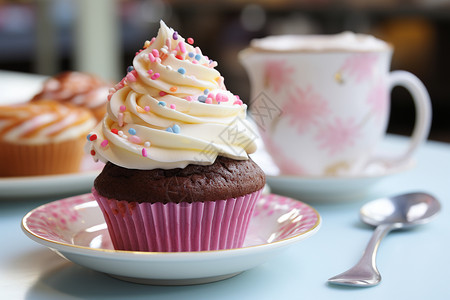 粉红色的纸杯蛋糕高清图片