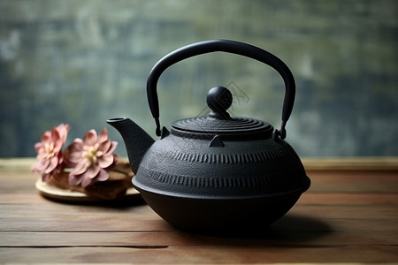一个黑色的茶壶背景图片
