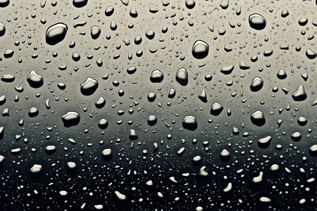 创意雨滴滑落玻璃背景背景图片