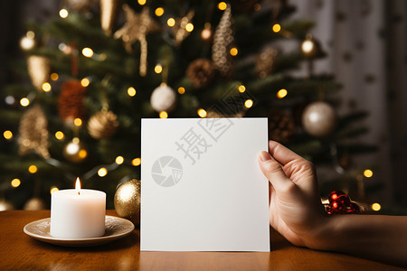 庆祝圣诞节日手拿空白的信件背景图片