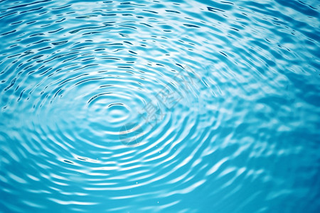 游泳池的水滴波纹背景图片