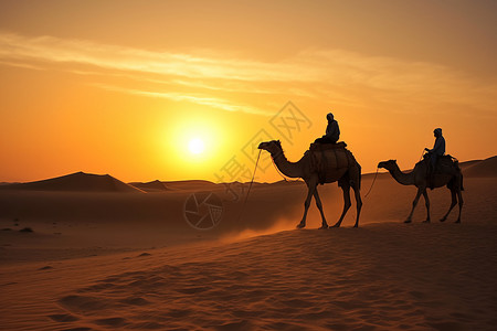 沙漠中骑着骆驼的男人图片