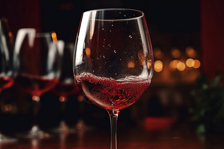杯子里的红酒背景背景图片