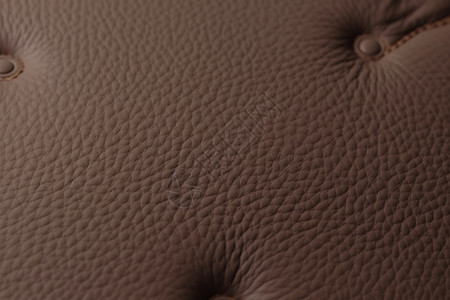 棕色皮革制品的纹理细节图片