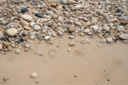 海滩上的鹅卵石背景图片