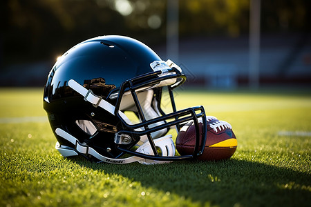 黑色边线草地上的橄榄球头盔背景