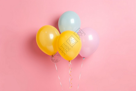 几个气球粉色背景上的气球背景