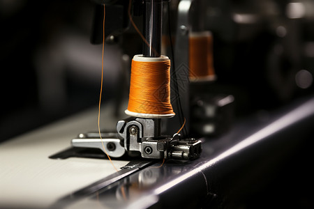 纺织产品带黄色线圈的缝纫机背景