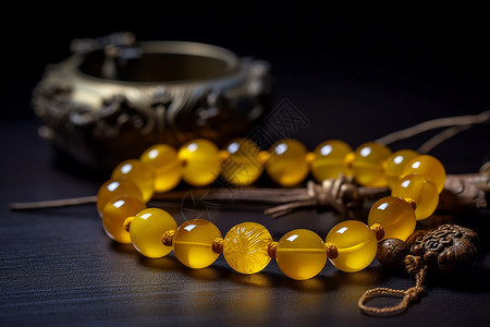 黄色波点款式款式时尚的琥珀念珠手串背景