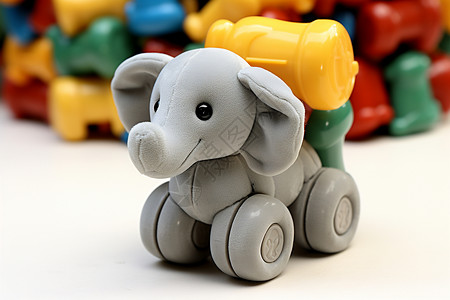 可爱的塑料大象玩具车背景图片