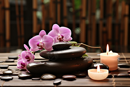 芳香疗法的岩石兰花和蜡烛背景图片
