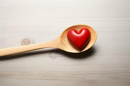 木勺里的心形食物背景图片