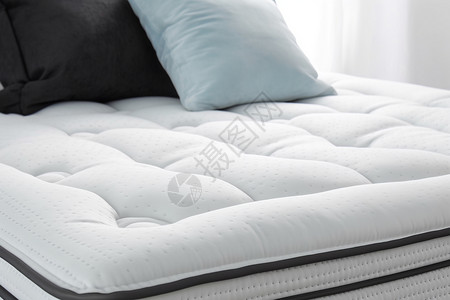 卧室中柔软的睡眠床垫图片